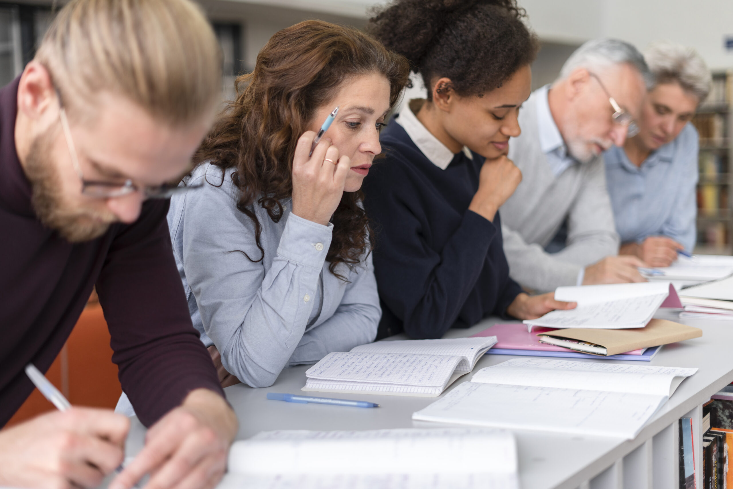 close-up-people-learning-together